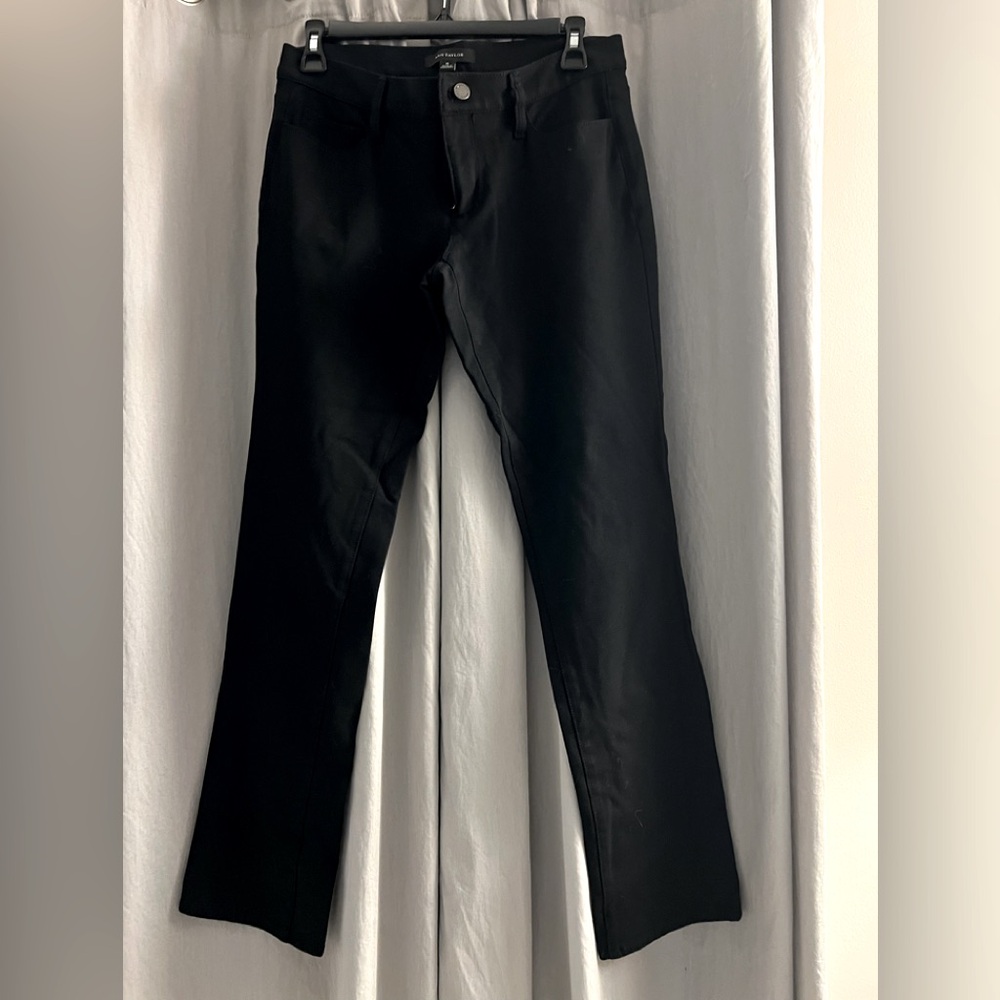 Women’s black five pocket pants.